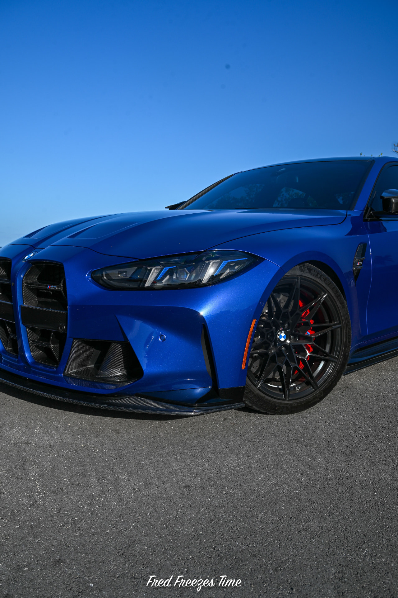 Blue BMW G8X M3 with dry carbon front aero fitted